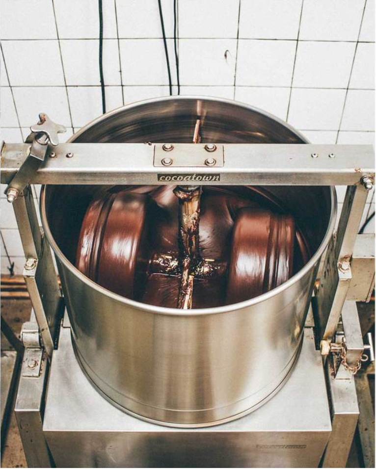 Chocolate moving through a conche