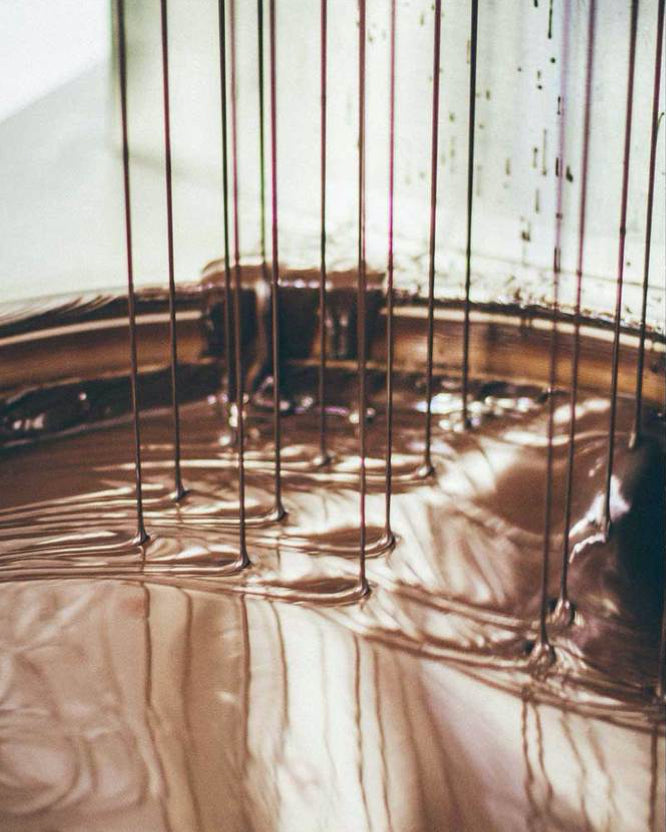 Tempered chocolate poured into molds